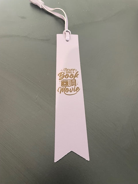Leather Bookmark with Tassel - Never Judge a Book by Its Movie